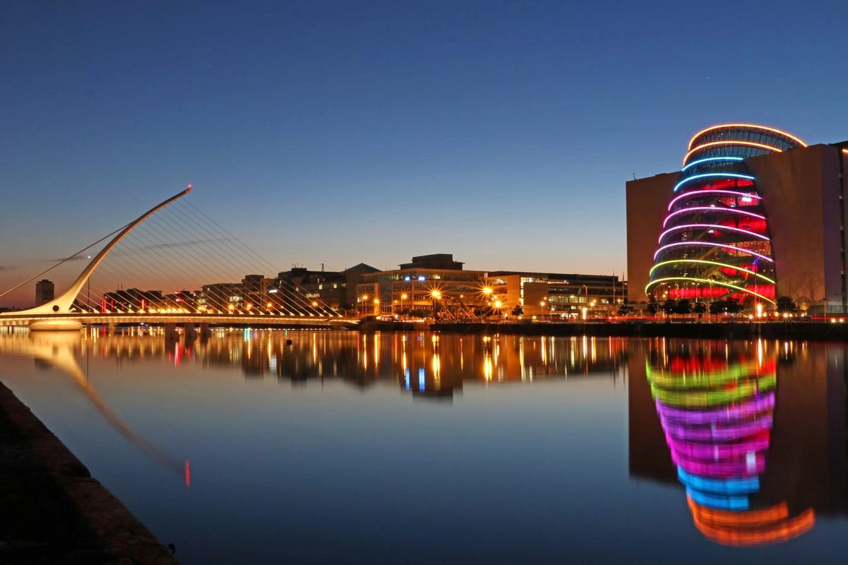 Convention Centre Dublin at night — illuminated CCD building and Samuel Beckett Bridge reflected in the River Liffey, Dublin's premier corporate conference venue