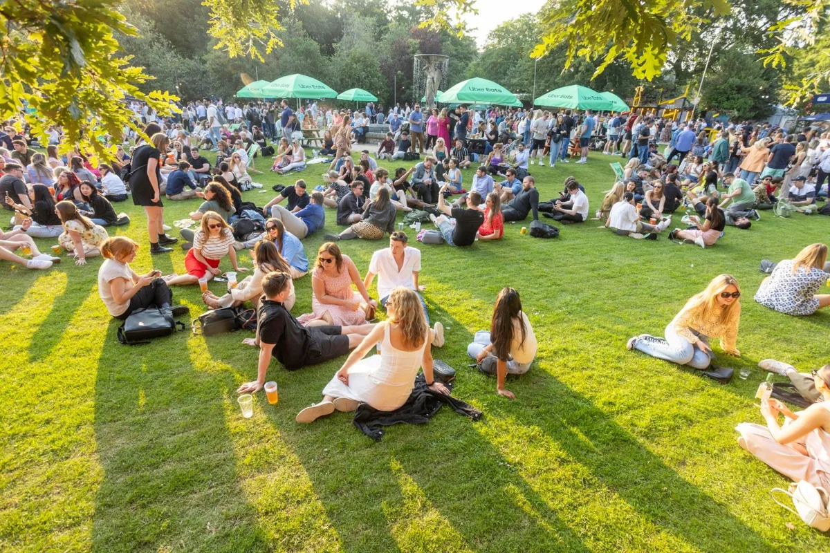 Crowds enjoying a summer evening at the Iveagh Gardens, Dublin 2 — one of Dublin's best outdoor concert venues, steps from EirStay serviced apartments