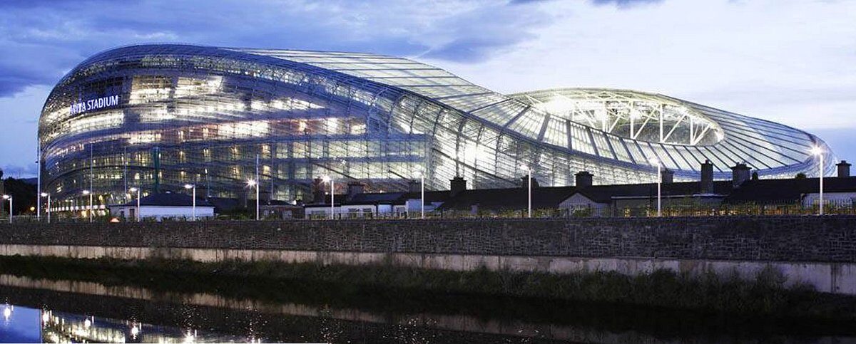 Aviva Stadium at dusk on Lansdowne Road, Ballsbridge, Dublin 4 — venue for Metallica's M72 World Tour in June 2026 and a five- to fifteen-minute walk from EirStay serviced apartments in Ballsbridge and Donnybrook