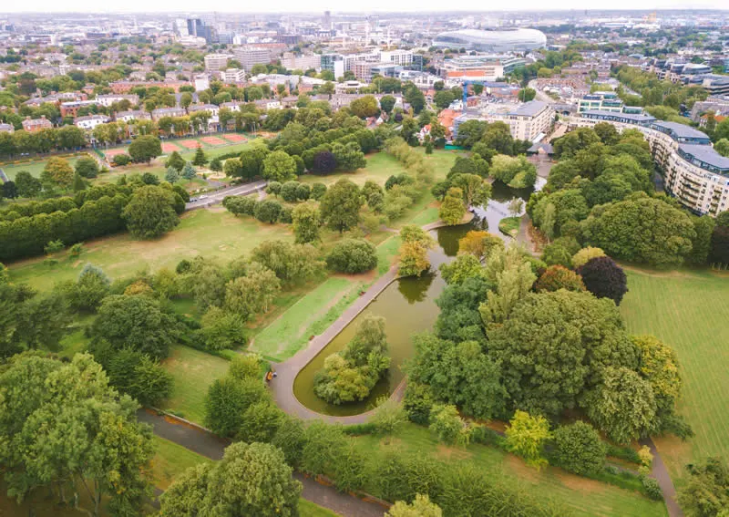 Aerial view of Herbert Park Dublin 4 near EirStay corporate apartments Donnybrook showing walking paths pond and mature trees