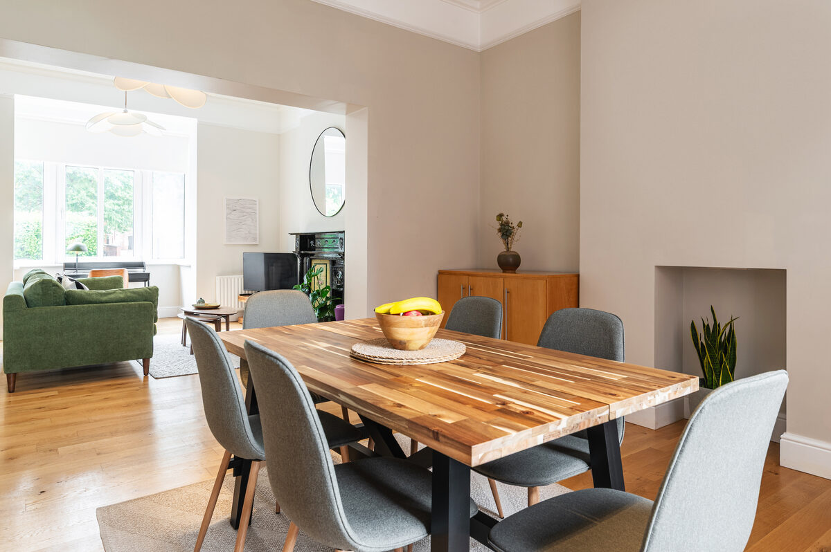 Open plan dining and living area with hardwood floors in EirStay corporate short stay apartment Donnybrook Dublin 4