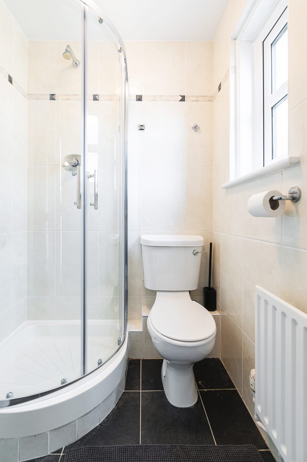 Modern shower room with tiled finish in EirStay short stay corporate serviced apartment Dublin 4