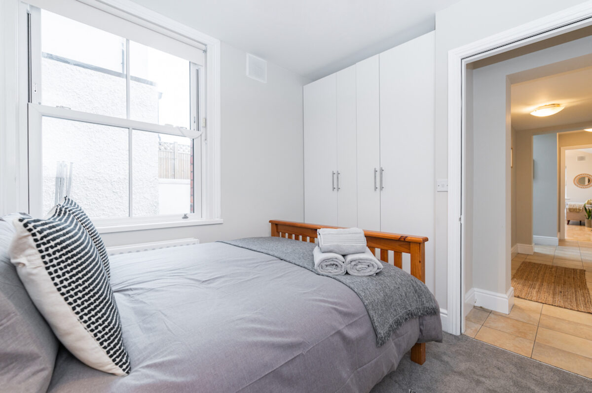Second bedroom with built-in wardrobes in EirStay serviced apartment Morehampton Road Donnybrook Dublin 4