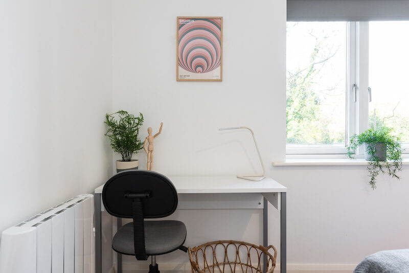 Dedicated work desk and task lamp in EirStay Islandbridge serviced apartment — ideal for remote working in Dublin 8