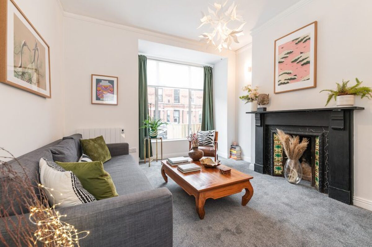 Bright living room with fireplace in EirStay corporate stay short-term accommodation Ranelagh Dublin 6