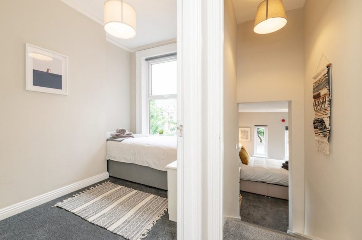 Master bedroom with premium linens in EirStay serviced apartment Ranelagh Dublin 6