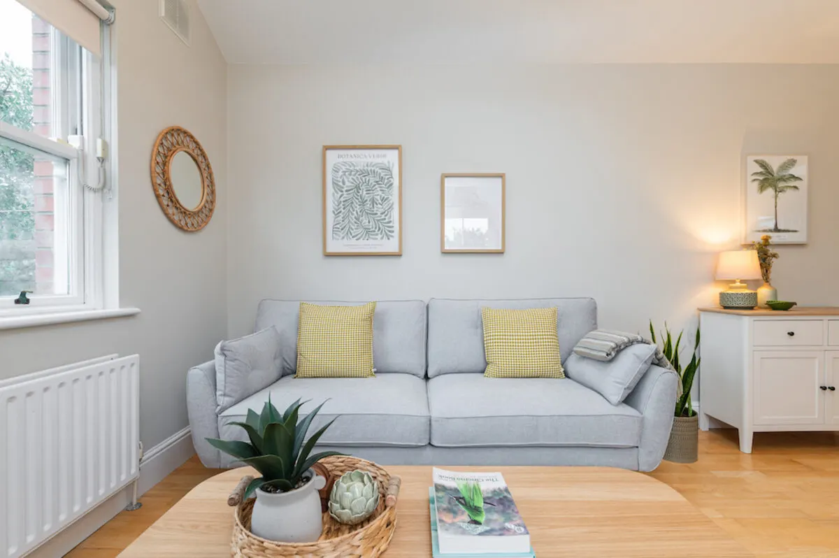 Bright living room with comfortable sofa in EirStay corporate short stay apartment Morehampton Road Donnybrook Dublin 4
