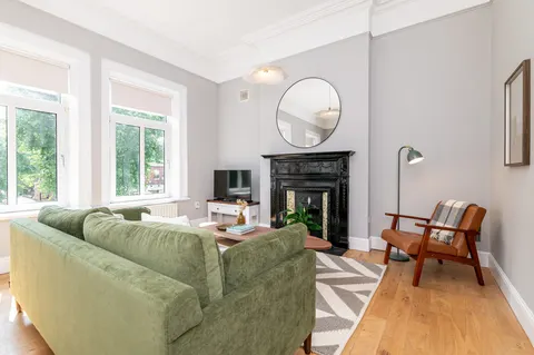 EirStay Donnybrook Dublin 4 living room with fireplace for corporate short stays