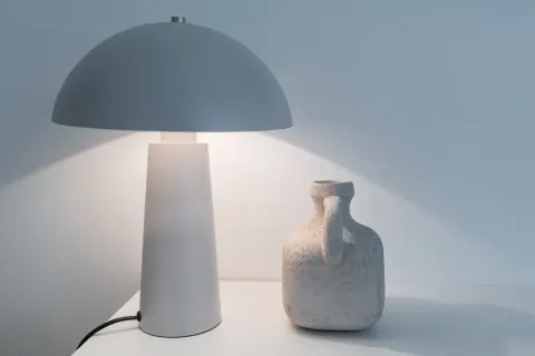 Table lamp and ceramic vase in the Rathgar apartment