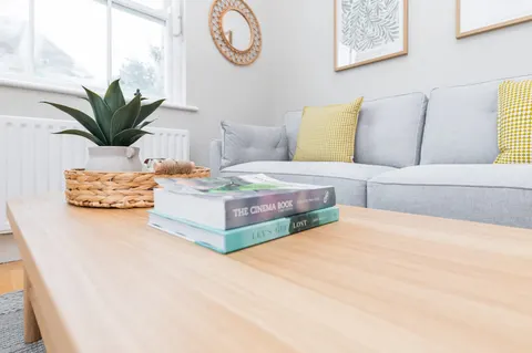 Coffee table with books and plant detail in EirStay serviced apartment Morehampton Road Donnybrook Dublin 4