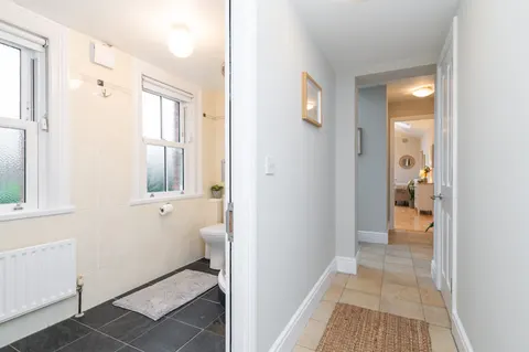 Tiled hallway connecting bathroom and living areas in EirStay serviced apartment Morehampton Road Donnybrook Dublin 4