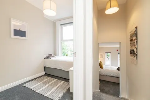Master bedroom with premium linens in EirStay serviced apartment Ranelagh Dublin 6